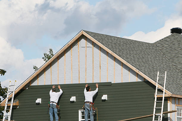 Professional Siding Contractor technician working in Henderson, TX
